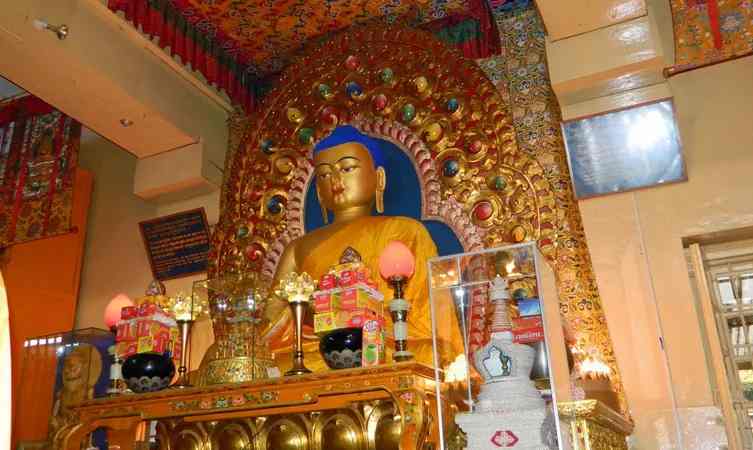 Monks walking in Tsuglagkhang courtyard